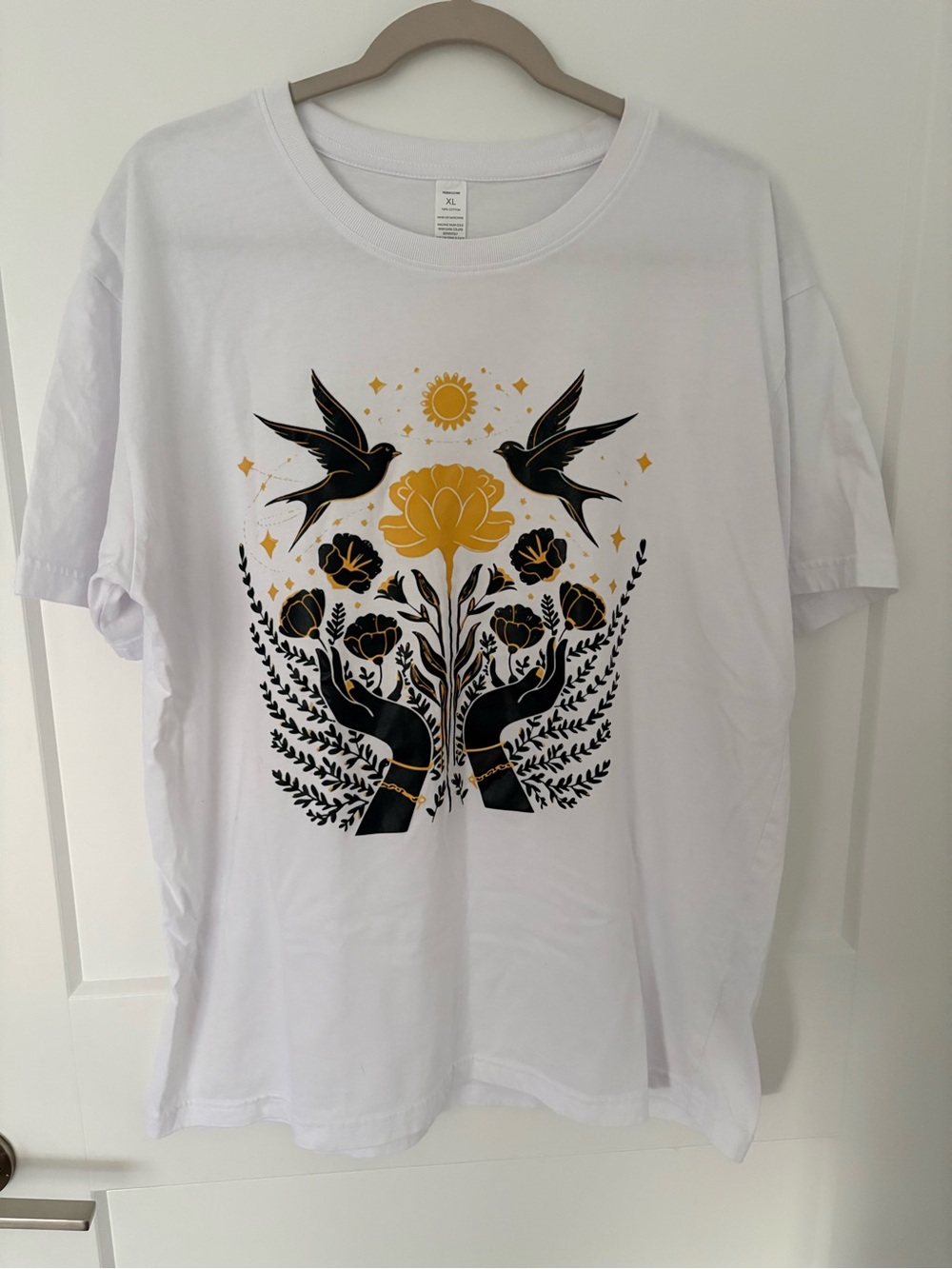 White Short Sleeve Tee with Black & Gold Floral Graphic